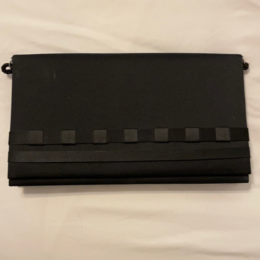 Black satin clutch.